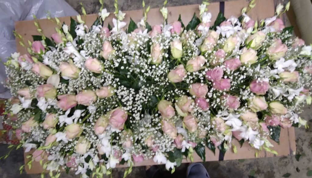 Copricassa funebre rosa